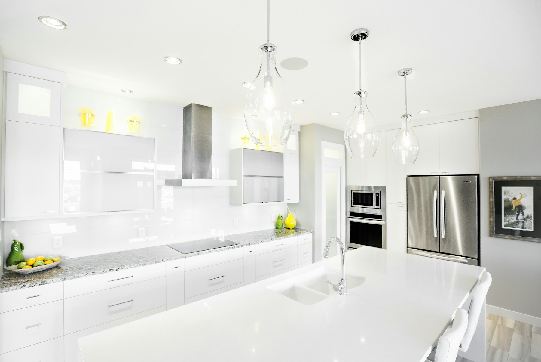 Bright modern kitchen with stainless-steel refrigerator